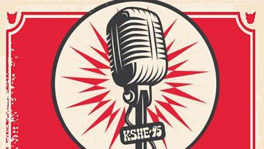 Old fashioned microphone with a sign that says "KSHE 95"