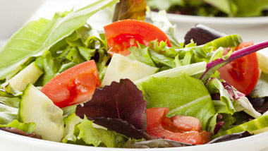spring greens salad with tomatoes and cucumbers